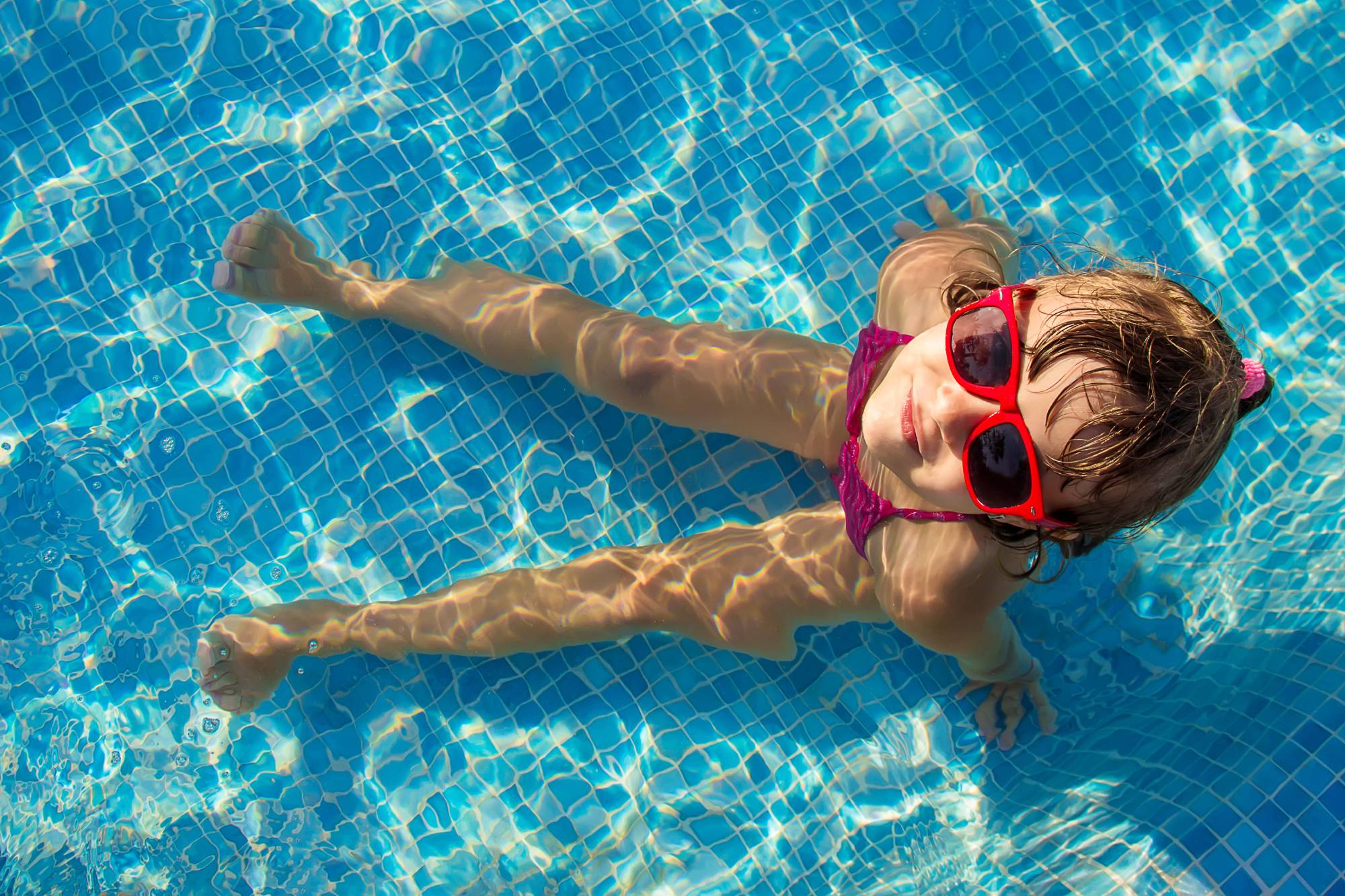 Pourquoi installer un abri de piscine ? H&oelig;nheim
